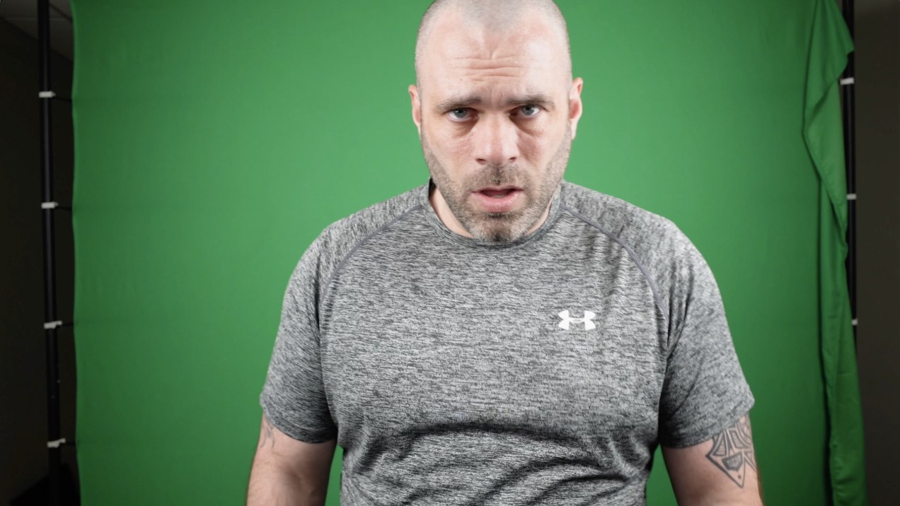 CJ Tuttle on green screen, editorial portrait